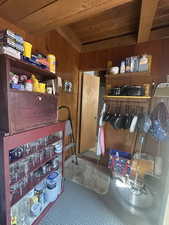 Miscellaneous room with wood walls