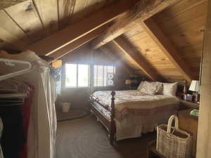 Bedroom with wooden ceiling