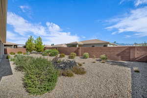 View of fenced backyard