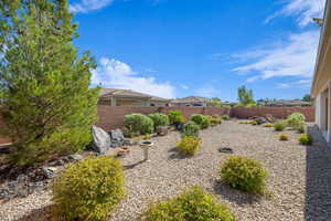 View of fenced backyard