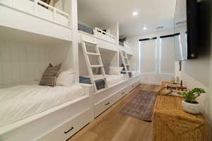 Bedroom featuring light wood finished floors and recessed lighting