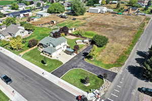 Aerial overview of property's location with nearby suburban area