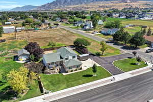 Aerial view of residential area featuring mountains