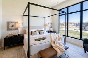 Bedroom with wood finished floors