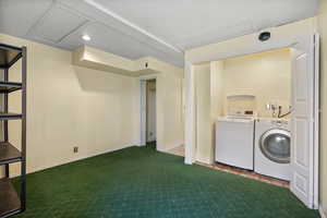 Washroom featuring separate washer and dryer, attic access, carpet floors, and recessed lighting