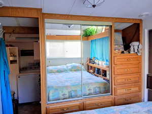 Bedroom featuring washer / clothes dryer