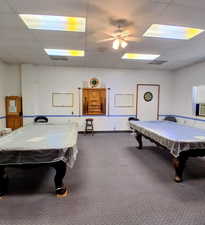 Game room featuring billiards, carpet, a drop ceiling, and a ceiling fan
