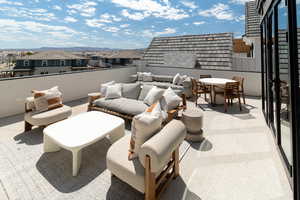 Patio / terrace with outdoor dining space, a residential view, and outdoor lounge area