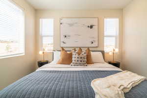 Bedroom featuring multiple windows