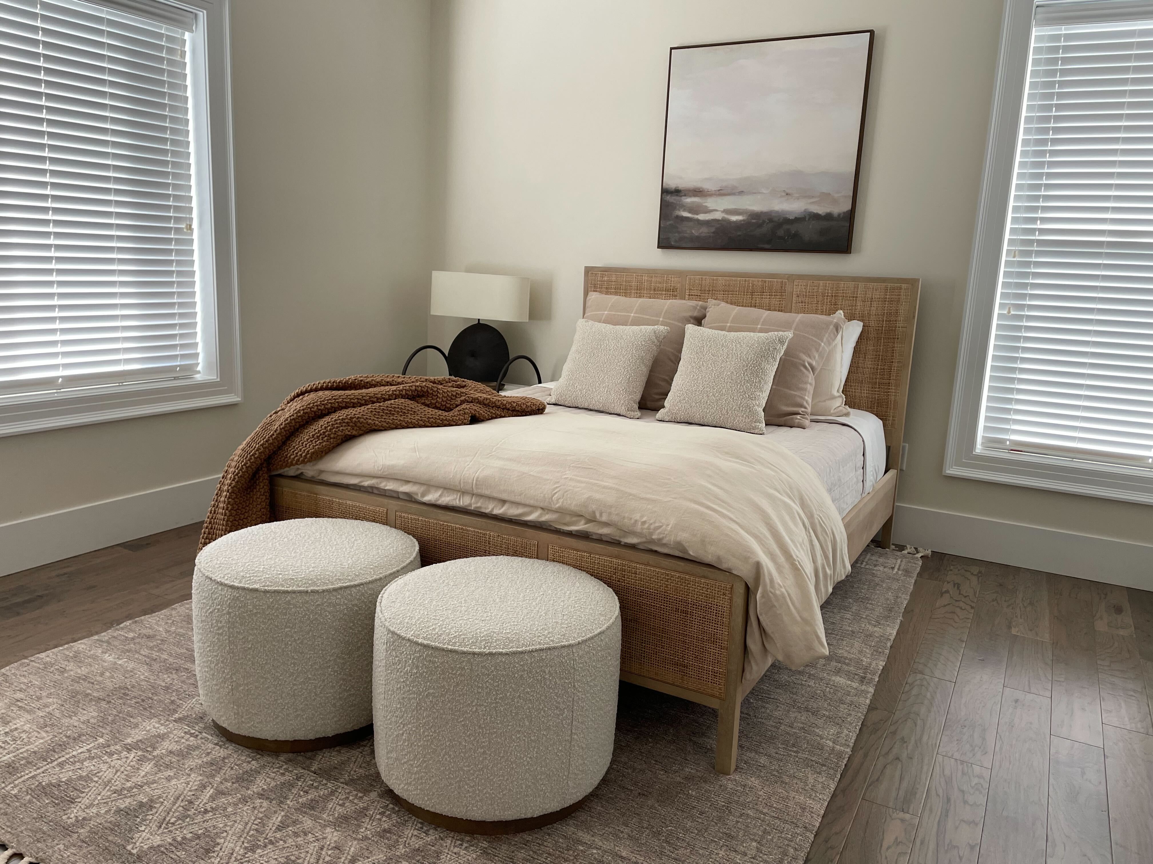 Bedroom with wood finished floors and baseboards