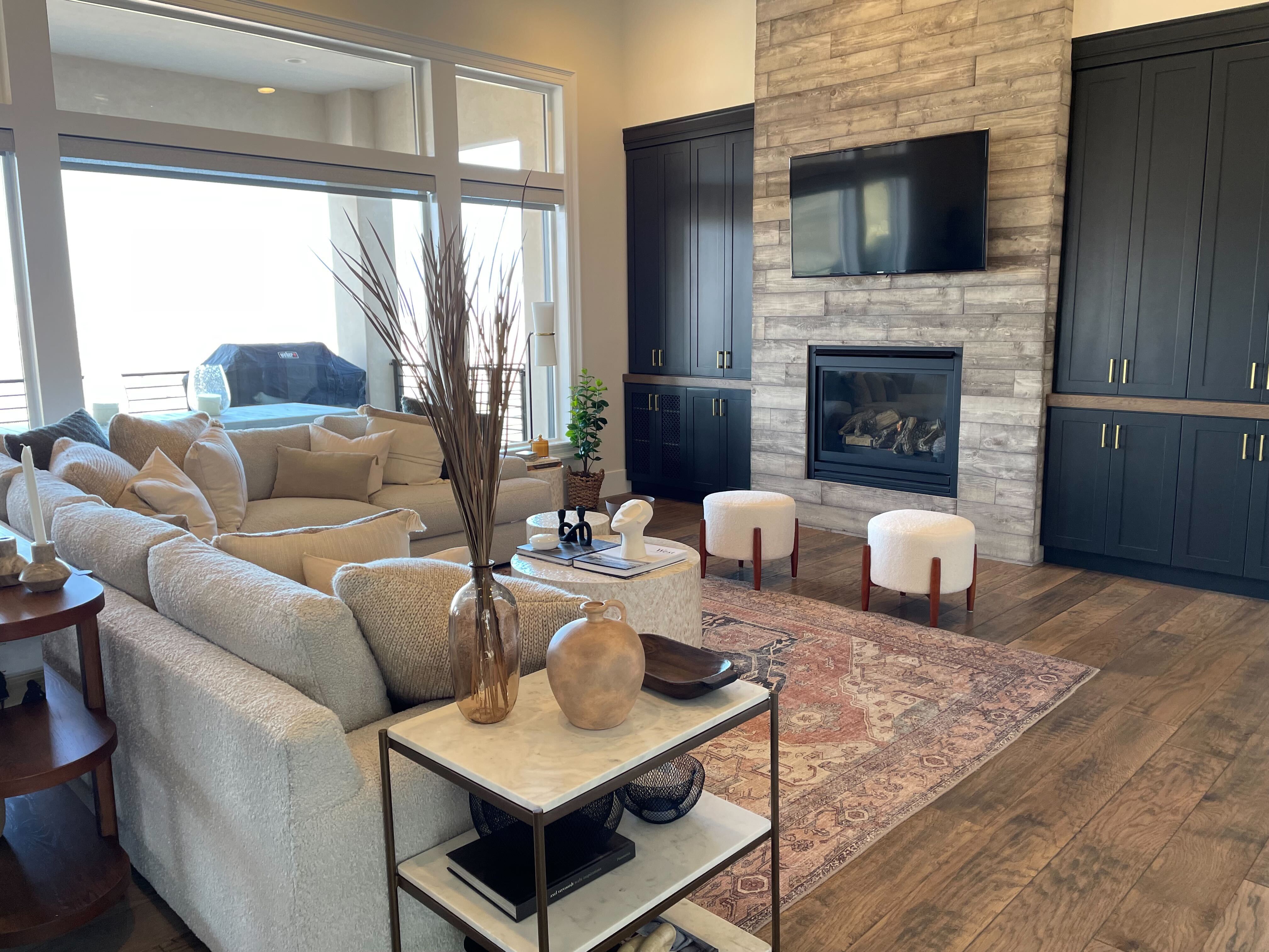 Living room featuring dark wood finished floors and a fireplace