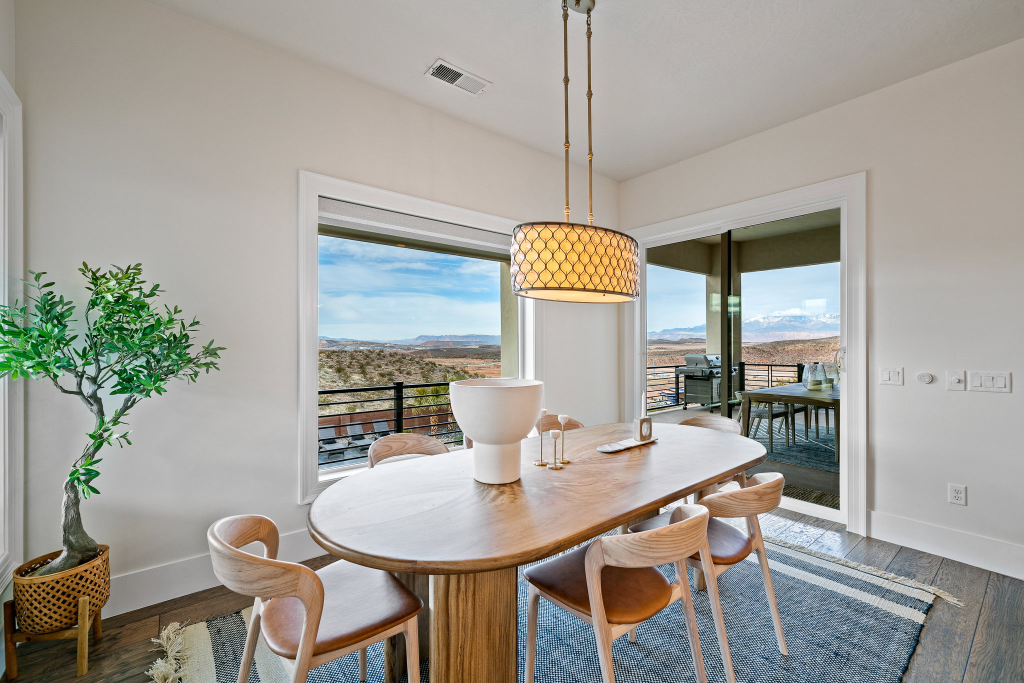Dining space featuring a mountain view and hardwood / wood-style floors