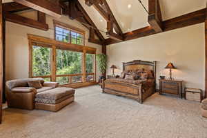 Bedroom with beamed ceiling, carpet, high vaulted ceiling, and recessed lighting