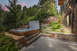 View of patio / terrace featuring a hot tub