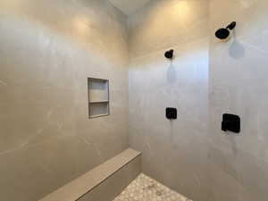 Bathroom with tiled shower