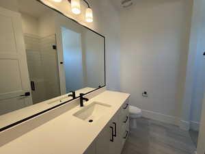 Bathroom with vanity and a shower stall