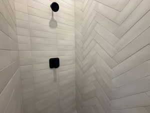Bathroom view of a tile shower