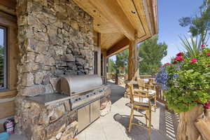View of patio with area for grilling