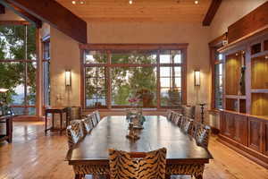 Dining area with light wood-style floors