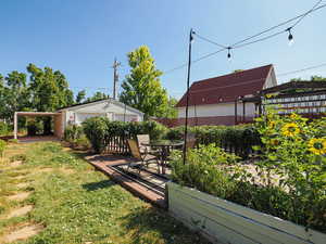View of yard with an outbuilding