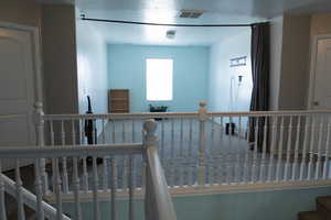 Corridor with a textured ceiling