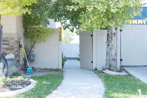 View of yard featuring a gate