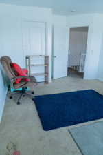 Unfurnished office featuring carpet flooring
