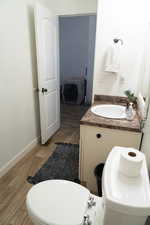 Bathroom with vanity and light wood-style floors
