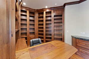 Office with recessed lighting and ornamental molding