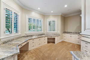 Bathroom featuring crown molding and recessed lighting