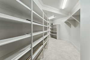 Spacious closet with tile patterned floors
