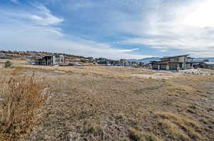 View of yard with a mountain view