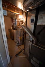 Utilities with heating unit and strapped water heater