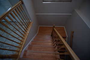 Stairway with wood finished floors