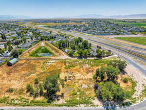 Aerial view of residential area featuring a mountainous background