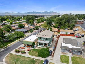 Aerial view of residential area with a mountainous background