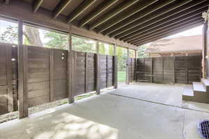 Beautiful back patio with total privacy goes out to the whole back yard.
