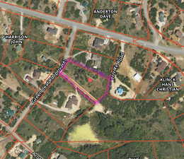Aerial map of property and surrounding area with property parcel outlined