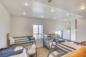 Lower level bonus room w/four twin/queen bunk beds