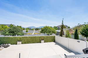 View of patio with a mountain view