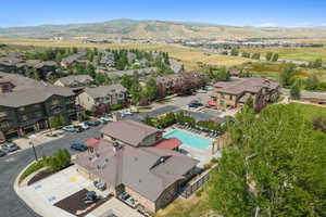 Aerial view of residential area featuring mountains
