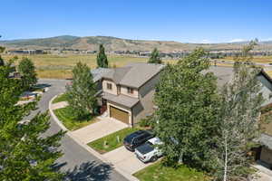 View of subject property featuring a mountain backdrop