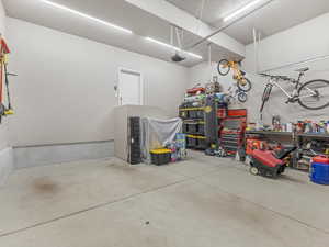Garage featuring a garage door opener
