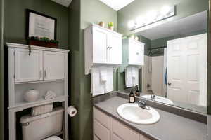 Bathroom featuring toilet and vanity