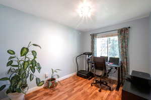 Home office featuring light wood-style flooring