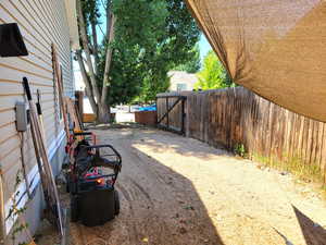 View of yard featuring a gate