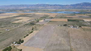 View of property location featuring a water and mountain view and rural landscape