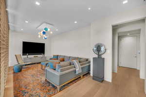 Living area featuring recessed lighting and wood finished floors
