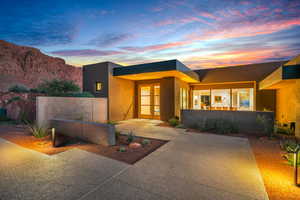 View of front of house featuring stucco siding