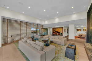 Living area with recessed lighting and wood finished floors